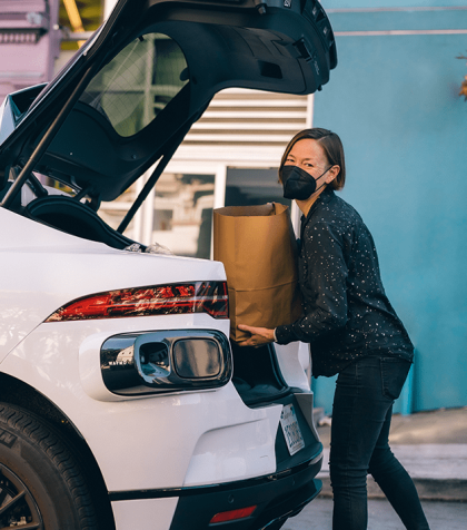 SF LGBT Partner loading groceries into a Waymo